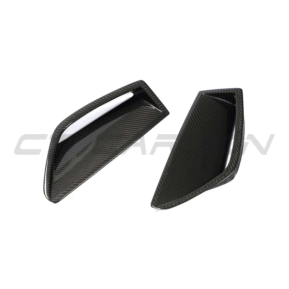 Audi RS6 C8 2019+ full carbon fiber kit by CT Carbon, front bumper vent trim detail on the car.