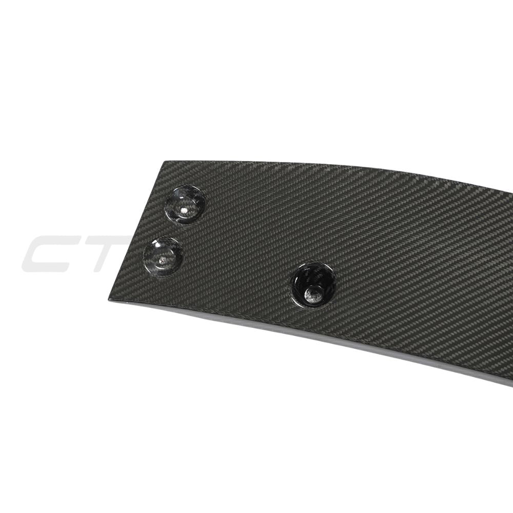 Audi RS6 C8 full carbon fibre kit by CT Design, including front splitter and aerodynamic enhancements, on a sleek vehicle.
