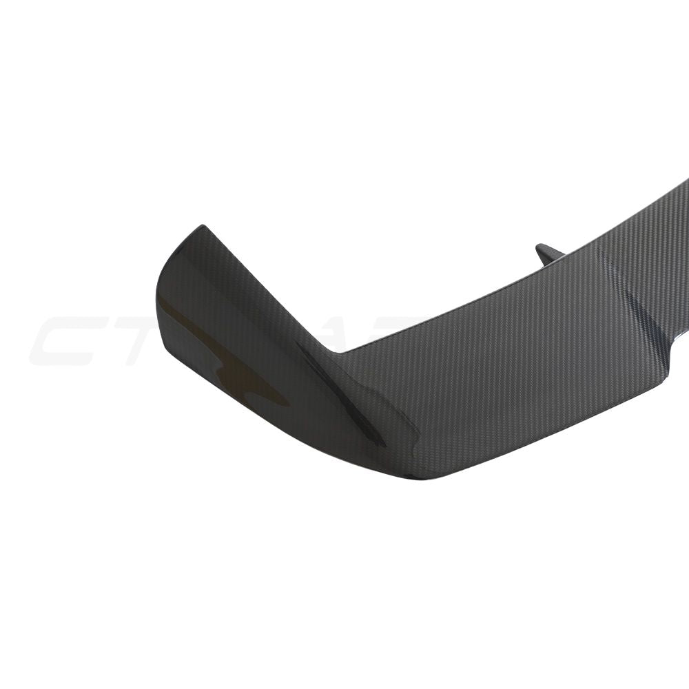 Carbon fibre roof spoiler for Audi RSQ8 2020+ by CT Carbon, shown installed on the vehicle's roof for aerodynamic enhancement.