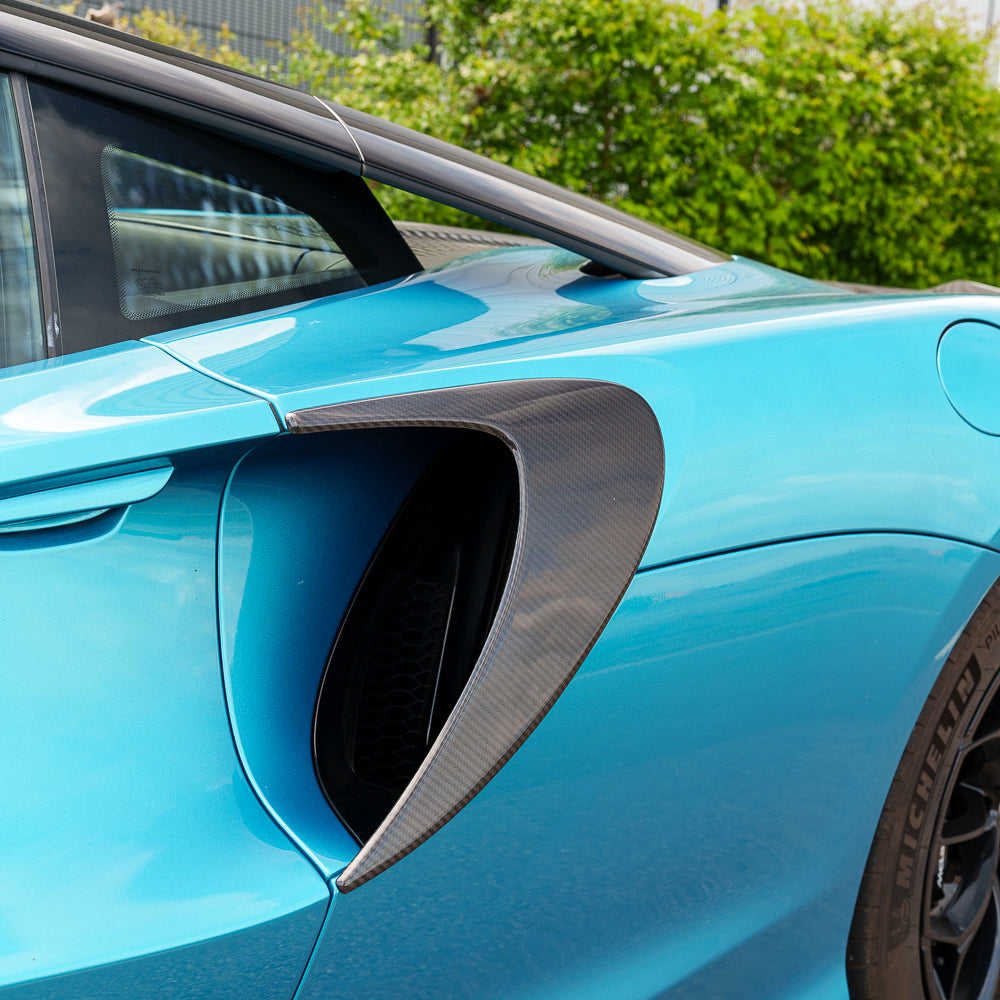 Full view of the CT Carbon McLaren Artura full carbon fibre kit, showcasing the sleek, lightweight carbon fiber components on the car.
