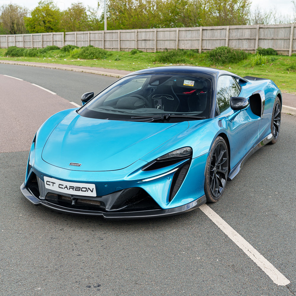 MCLAREN ARTURA full carbon fibre kit by CT Carbon, showing sleek carbon fiber panels and detailed car parts.