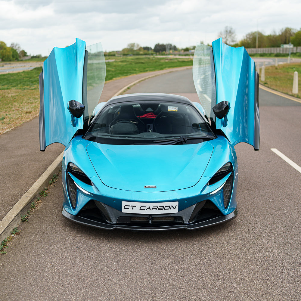 CT Carbon McLaren Artura full carbon fibre kit V1 showing detailed carbon fiber panels and sleek design on a sports car.