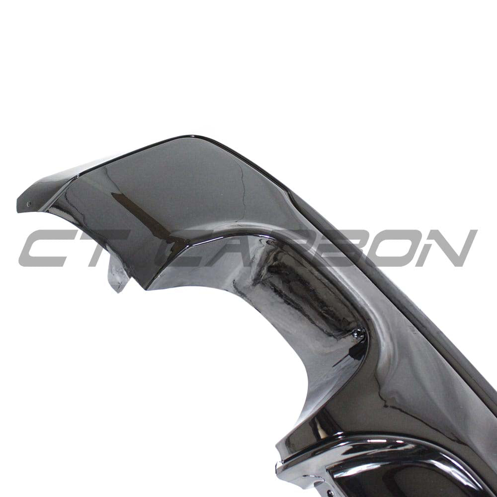 BMW 2 Series F23 gloss black full kit with twin exhaust by CT Carbon, featuring MP style design on a sleek vehicle.