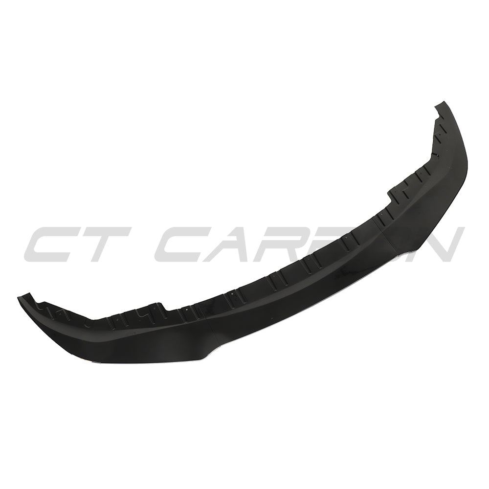 BMW 4 Series G26 and i4 gloss black splitter by CT Carbon installed on a vehicle, showcasing sleek aerodynamic design.