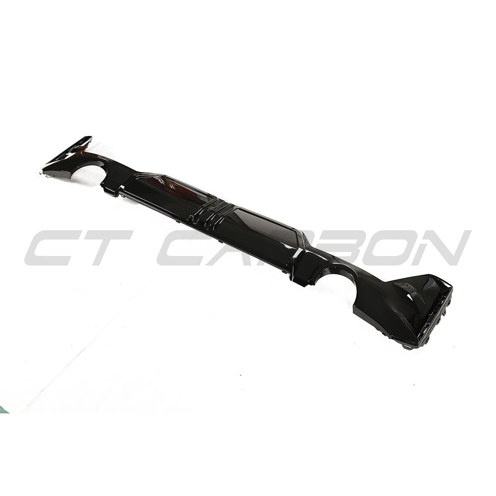 BMW G20 G21 3 Series 2022-2024 CT Carbon gloss black LCI diffuser with round tips, shown on a vehicle.