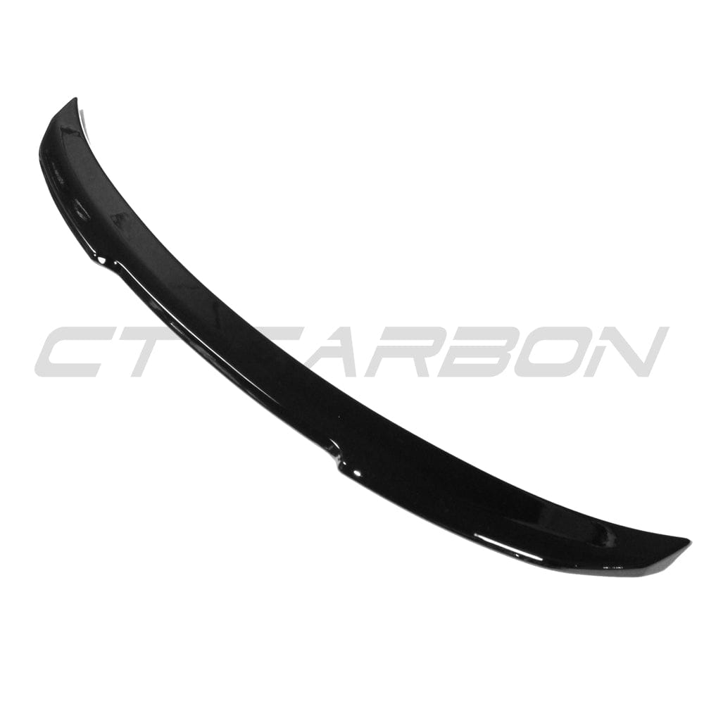 BMW 4 Series F32 V6 gloss black spoiler by CT Carbon, showcasing a sleek, aerodynamic design for enhanced vehicle style.