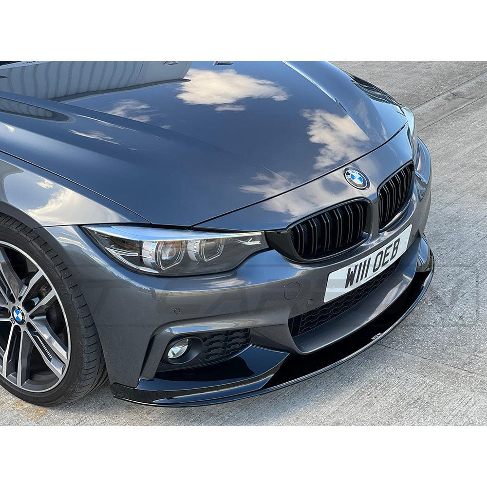 BMW 4 Series F33 gloss black full kit with dual exhaust system by CT Carbon, featuring sleek MP style design.