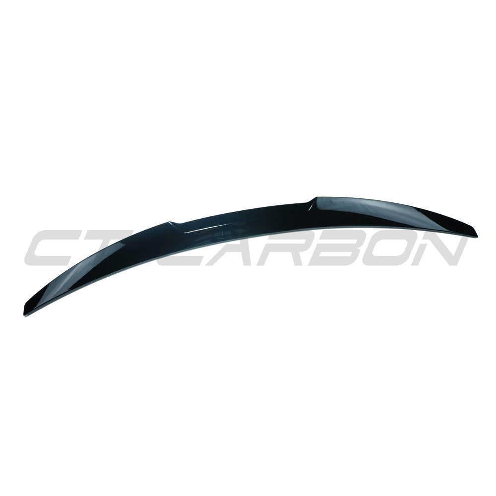 BMW 4 Series G22 2020+ CT Carbon gloss black spoiler, side view showing sleek aerodynamic design for sporty appearance.