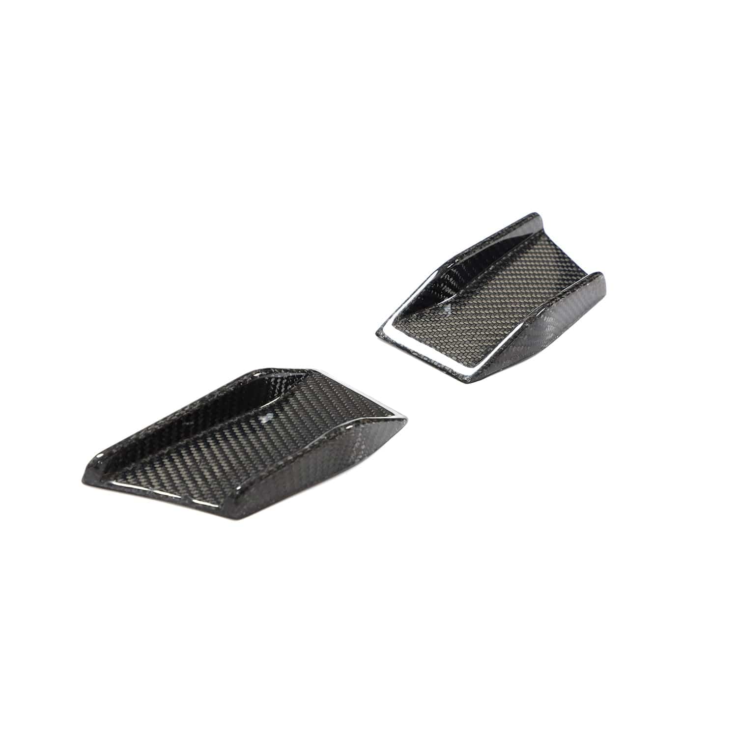 BMW 4 Series G22/G23 carbon fiber canards from CT Carbon, automotive accessories enhancing aerodynamic style.