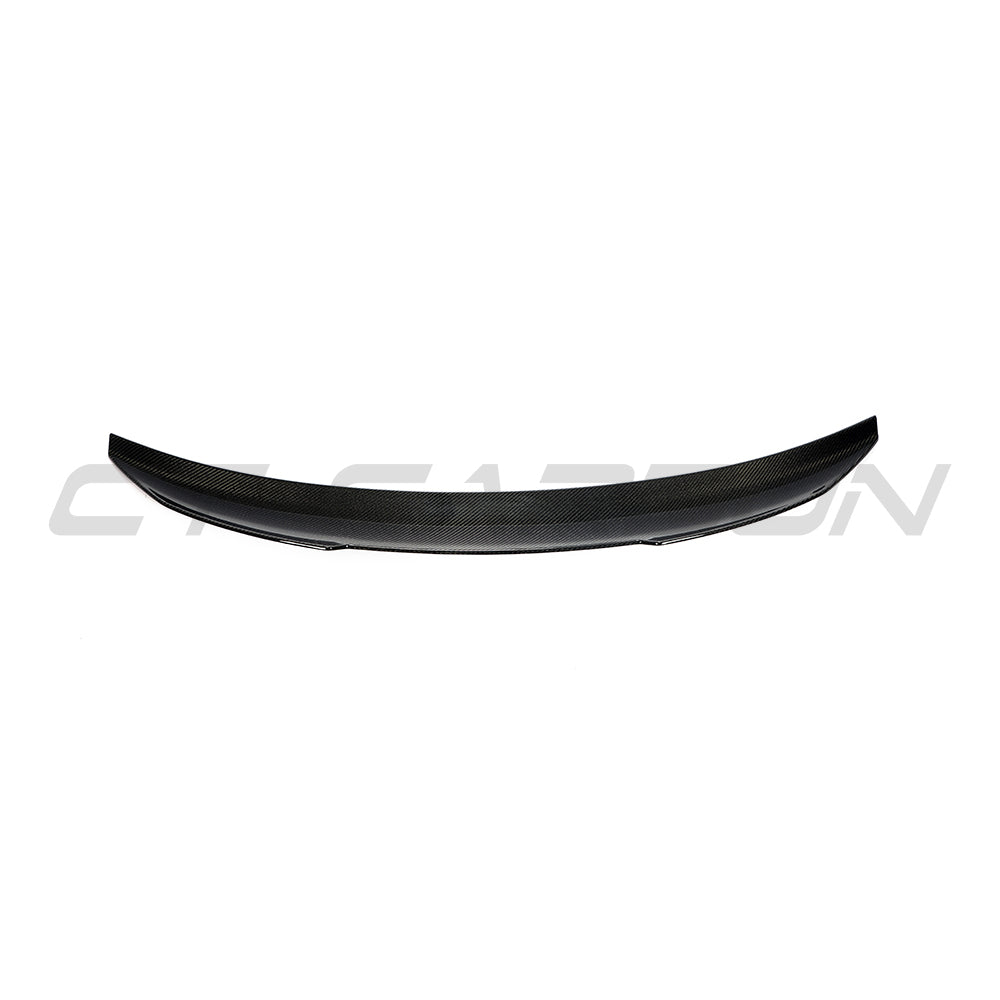 BMW 4 Series G26 and i4 carbon fibre spoiler by CT Carbon, showing sleek aerodynamic design and high-quality carbon material.