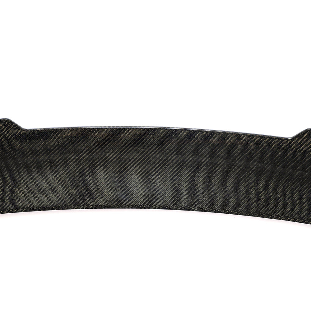 BMW 4 Series G26 and i4 carbon fibre spoiler by CT Carbon, showing sleek aerodynamic design and glossy finish.