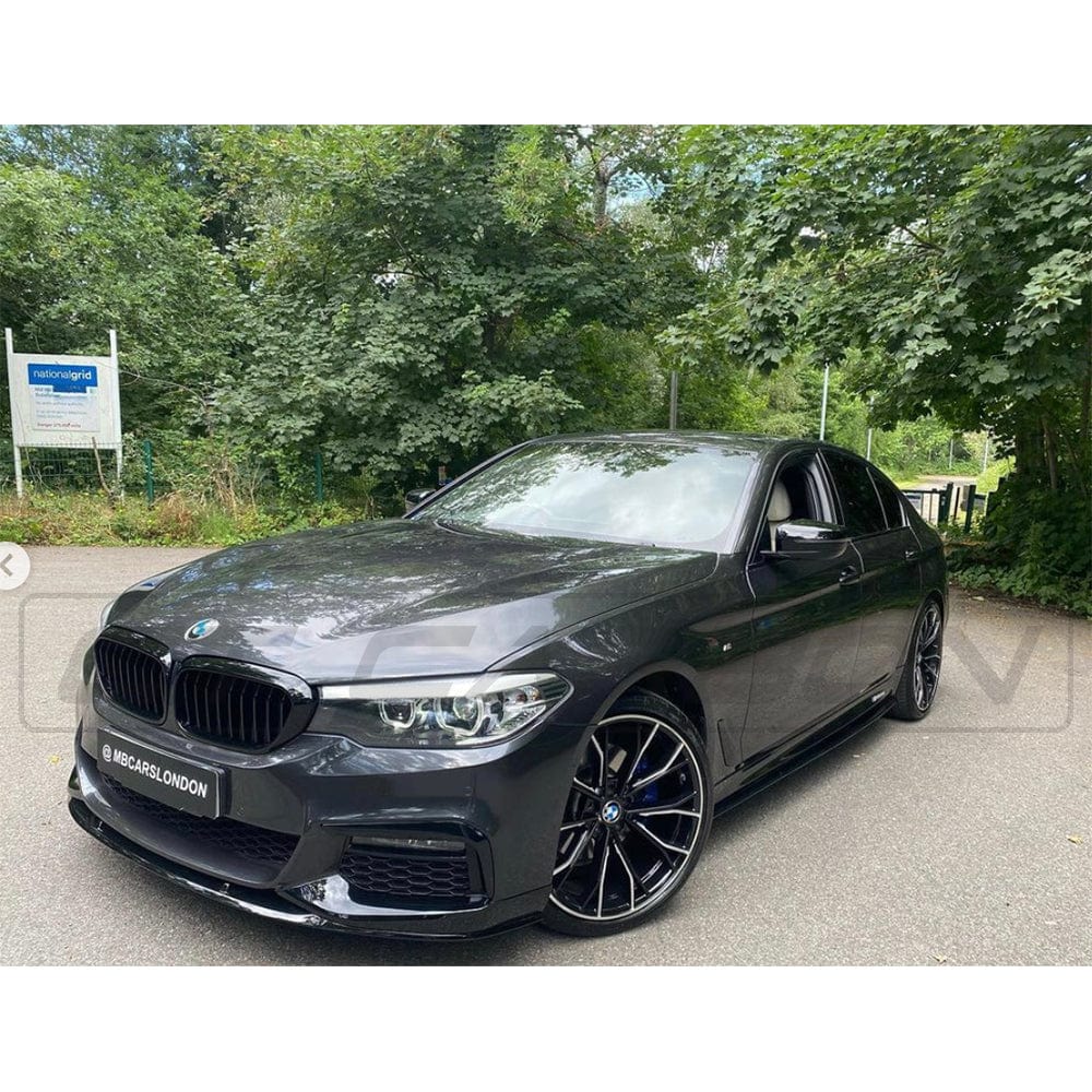 BMW 5 Series G30 gloss black full kit by CT Carbon, M5 style exterior upgrade for enhanced sporty appearance.