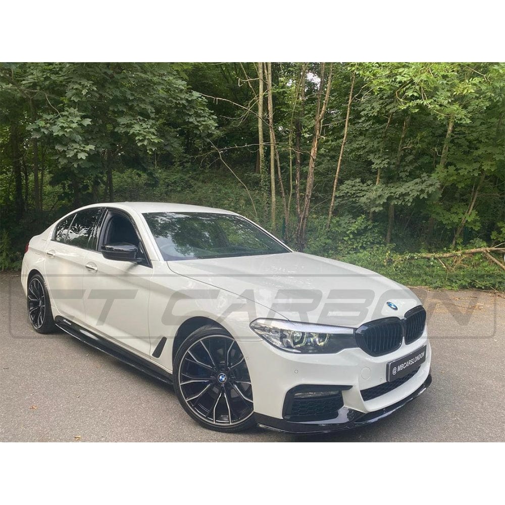 BMW 5 Series G30 gloss black full kit by CT Carbon, M5-style exterior upgrade with carbon fiber accents and detailed components.