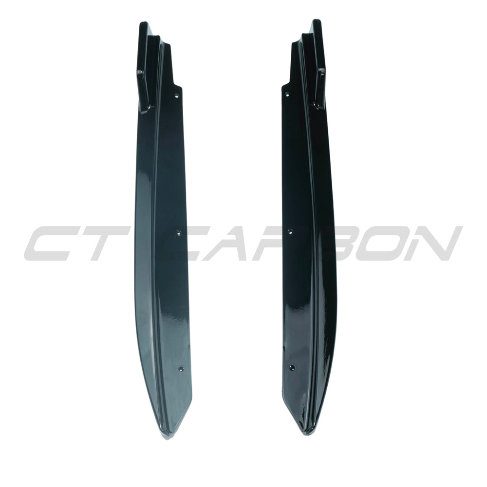 BMW 5 Series G30 gloss black rear bumper corners accessory by CT Carbon, showing sleek, curved automotive bumper corner details.