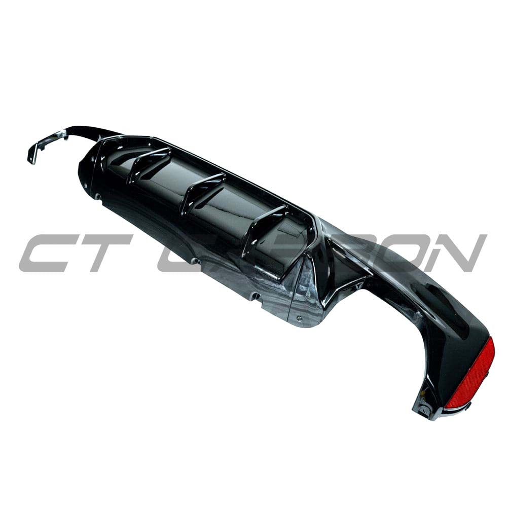 BMW 5 Series G30/G31 pre-LCI gloss black diffuser by CT Carbon, M-style design, shown on vehicle rear with sleek finish.