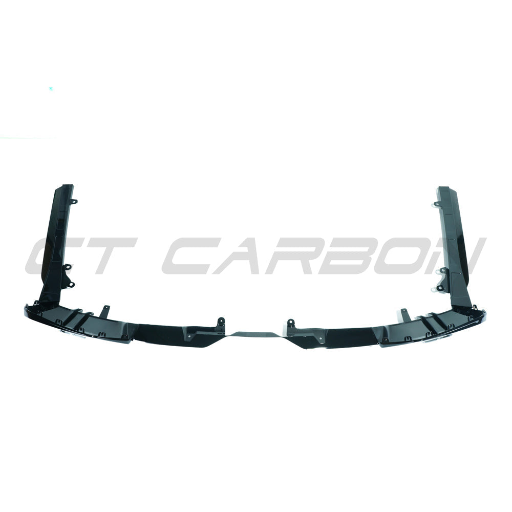 BMW 5 Series G60 and i5 2023 CT Carbon gloss black diffuser showing sleek aerodynamic design and carbon fiber finish.