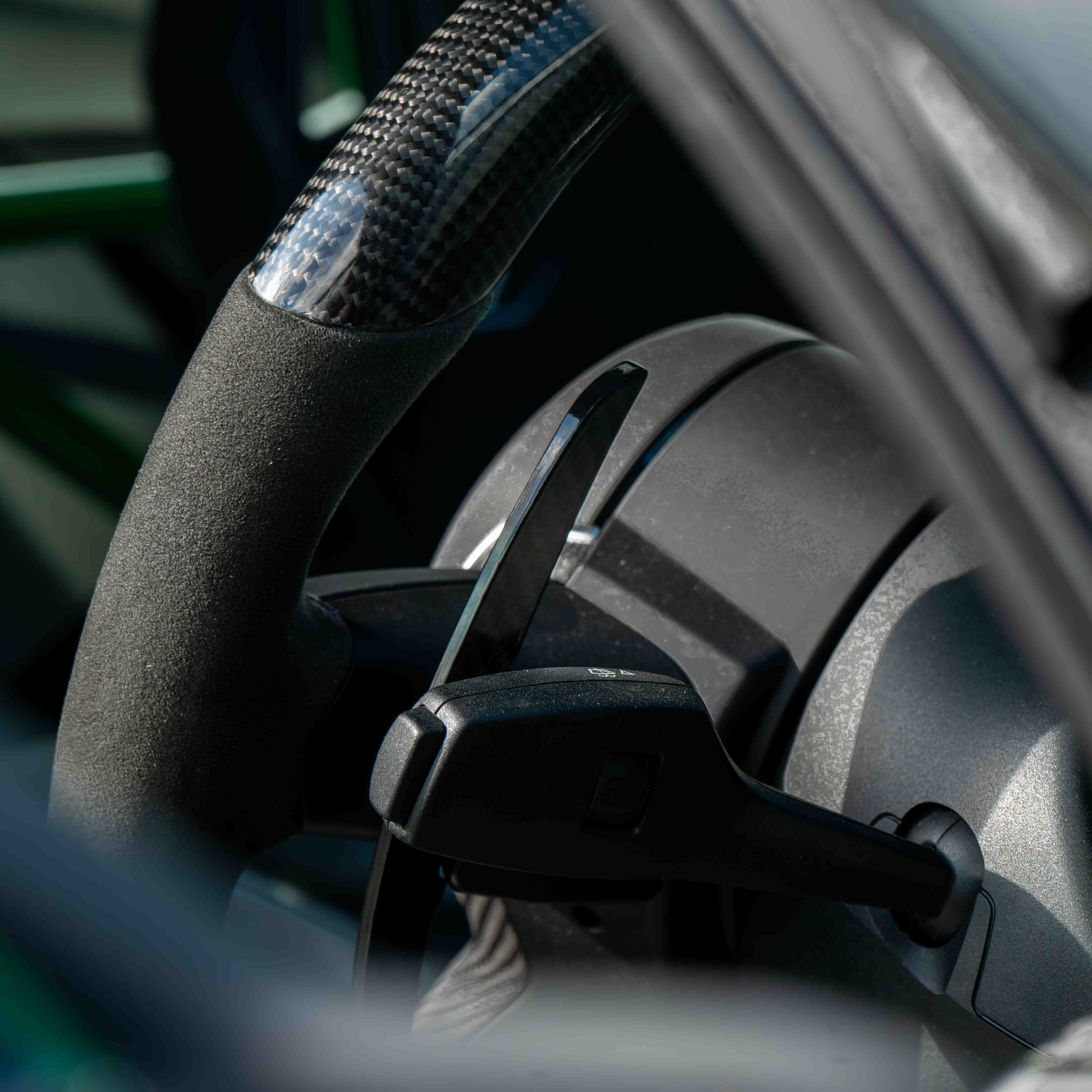BMW carbon fiber magnetic shifter paddles by CT Carbon, sleek and lightweight car accessories for enhanced driving control.