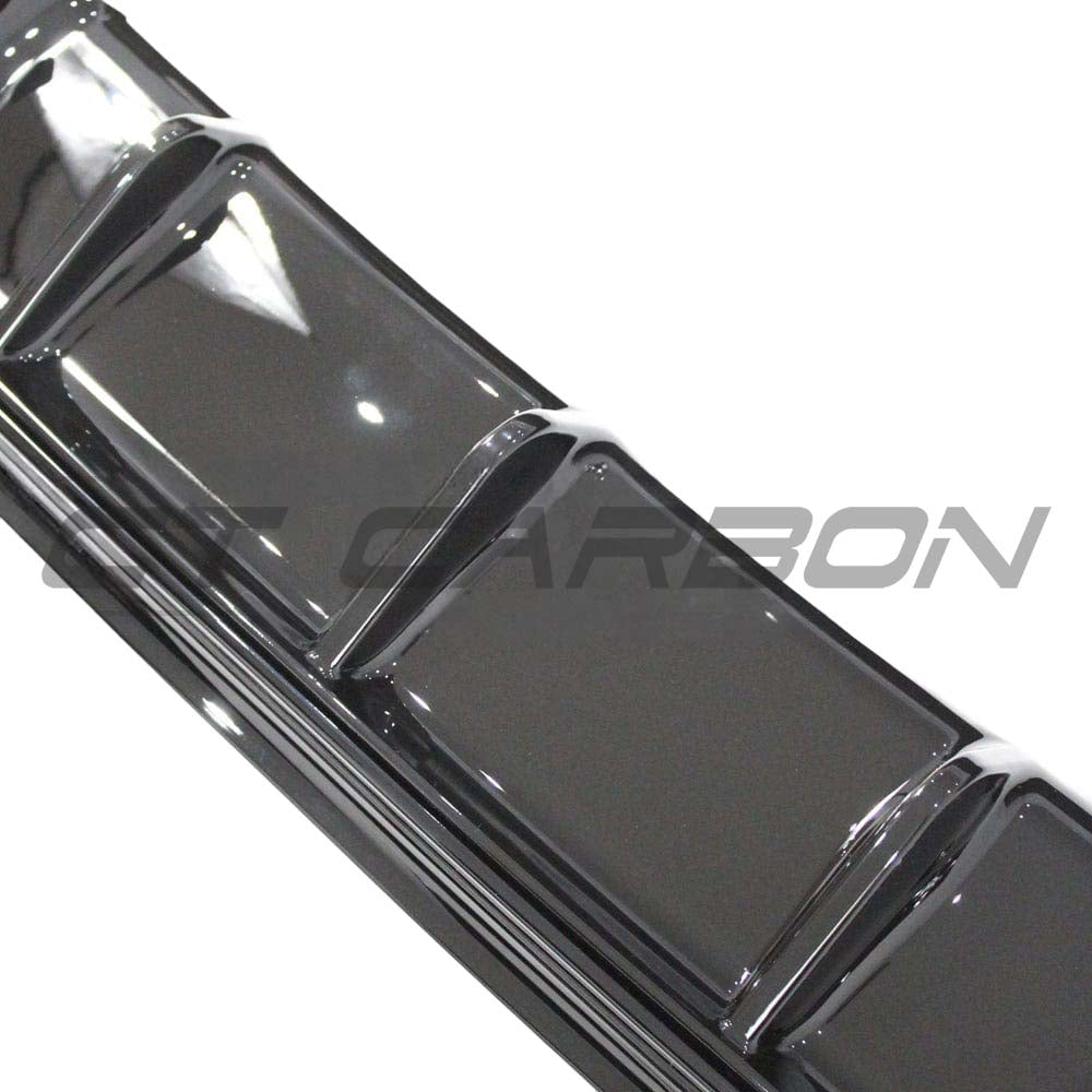 BMW F20/F21 1 Series LCI gloss black diffuser by CT Carbon, showcasing sleek, aerodynamic design for sporty rear styling.