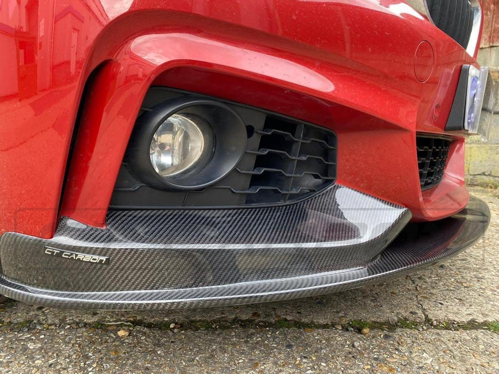 BMW F36 4 Series Coupe full carbon fiber kit by CT Carbon with twin exhaust, featuring sleek carbon fiber panels and sporty design.
