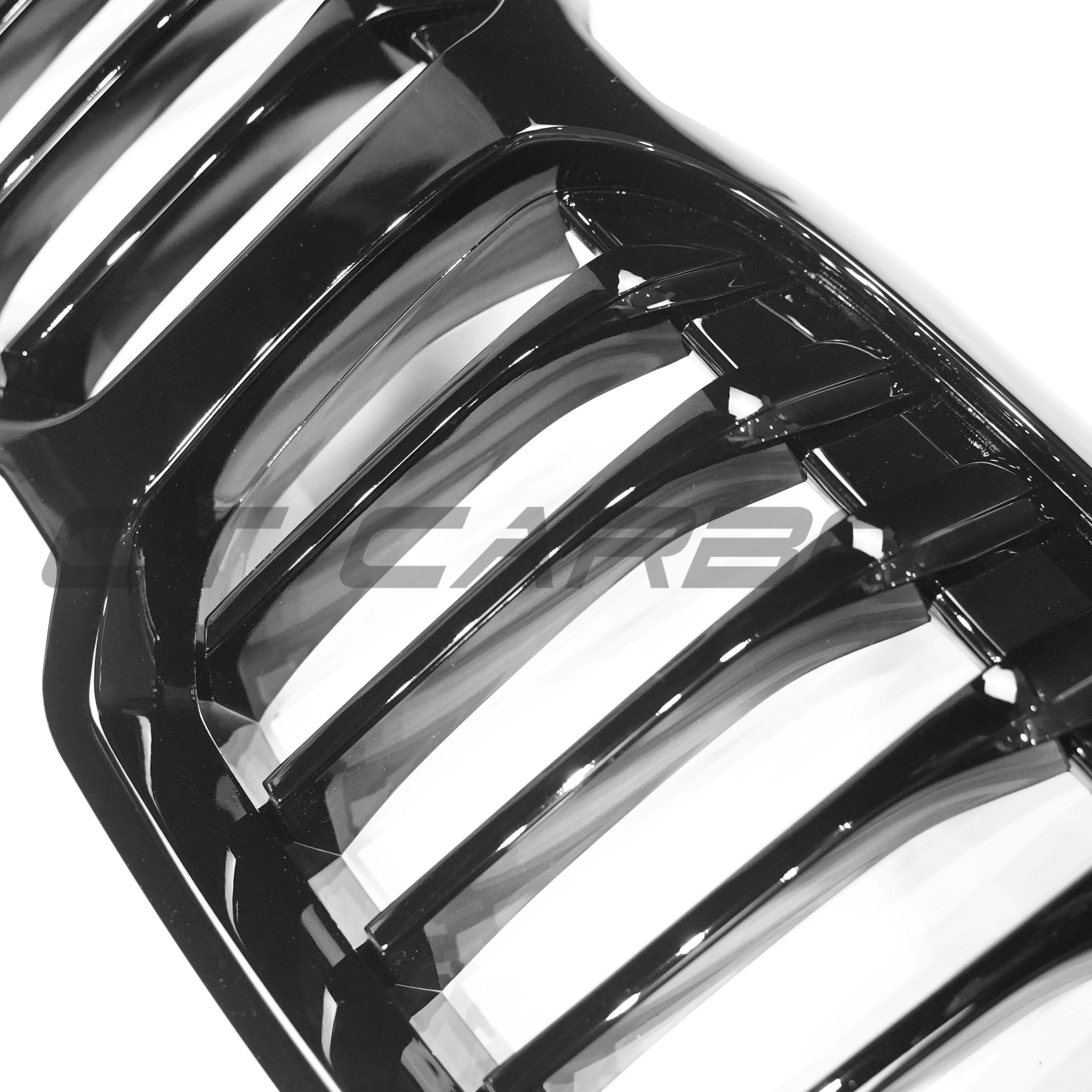 BMW F40 1 Series gloss black single slat grille by CT Carbon, showing the sleek grille design with a glossy black finish.