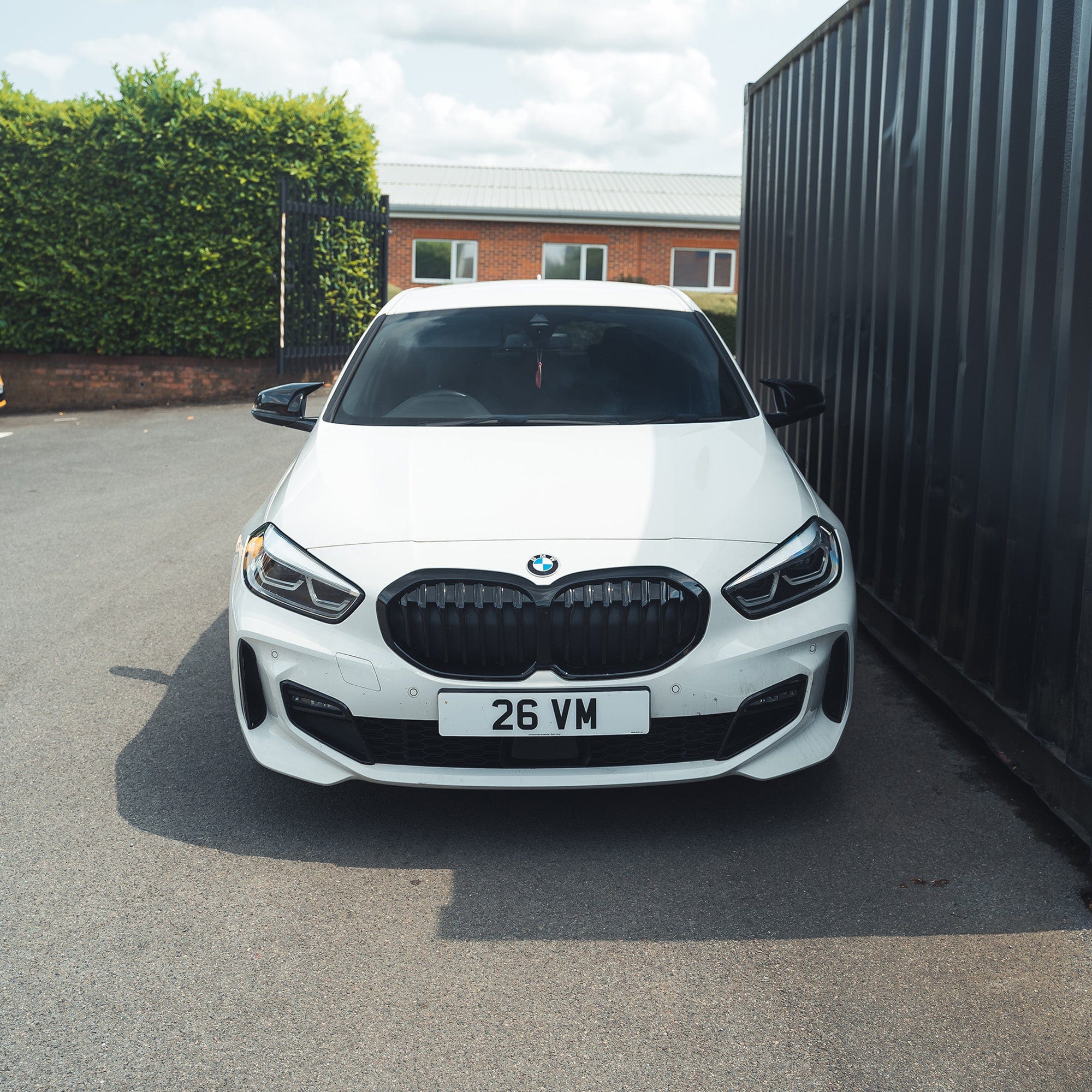 BMW F40 1 Series gloss black single slat grille by CT Carbon, showcasing sleek, high-quality automotive grille design.