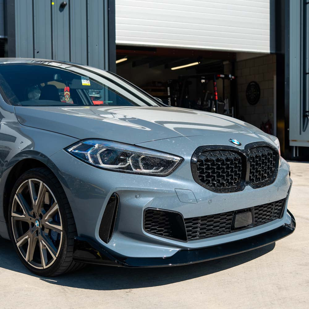 BMW F40 1 Series CT Carbon gloss black splitter V1, front aerodynamic splitter with sleek, high-quality finish and detailed design.