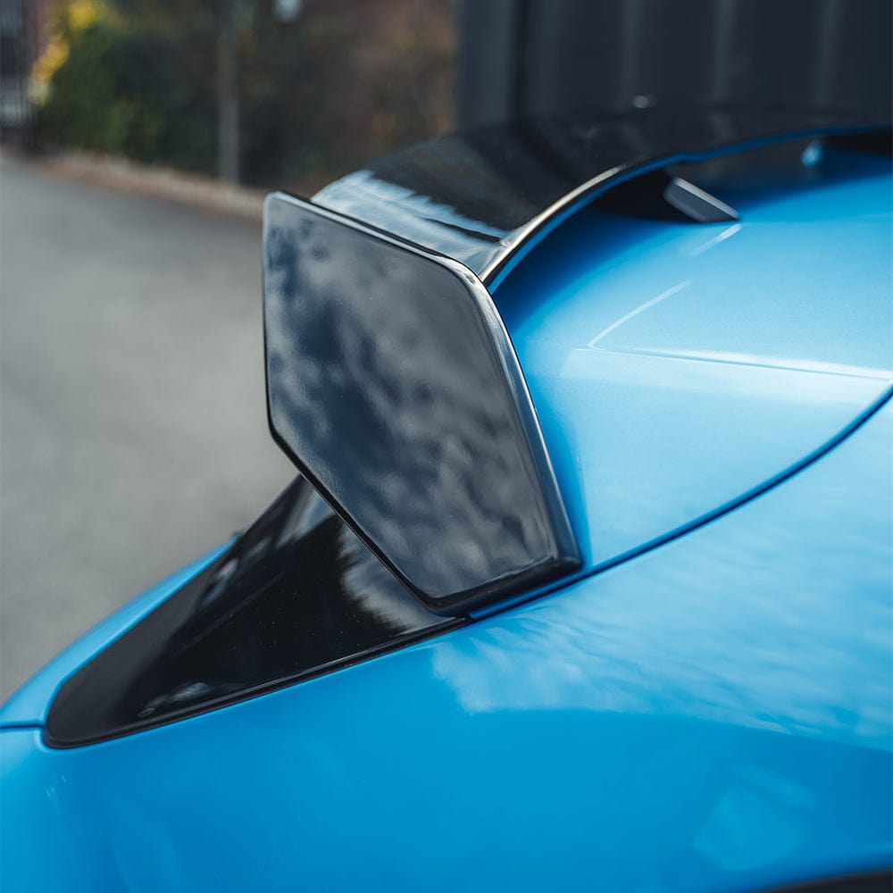 BMW F40 and F70 1 Series 2019+ CT Carbon gloss black spoiler, V1, showing sleek aerodynamic design on car's rear.