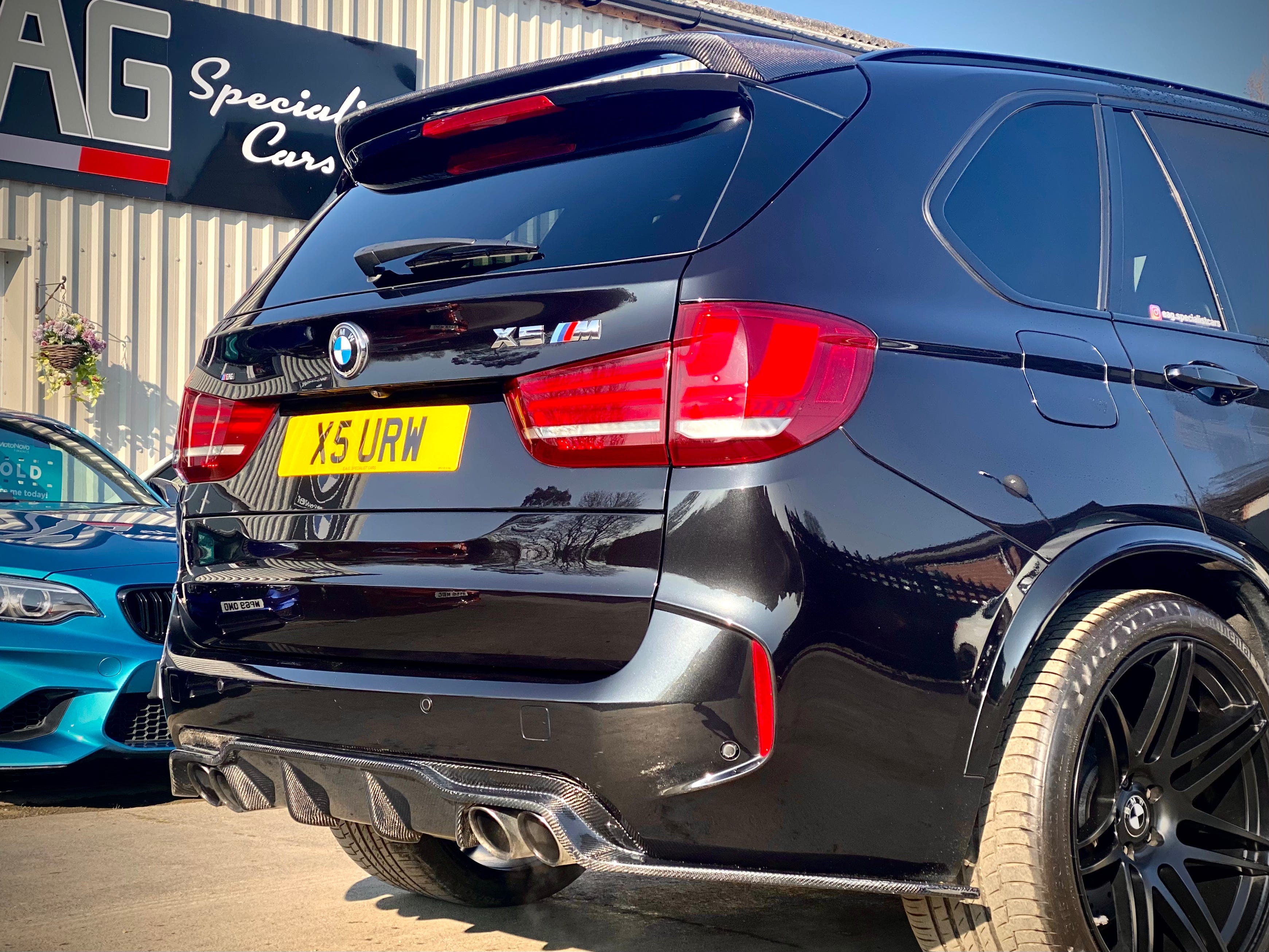 BMW F85 X5M carbon fibre full kit by CT Carbon, showcasing lightweight aerodynamic parts and sleek carbon fibre finish.