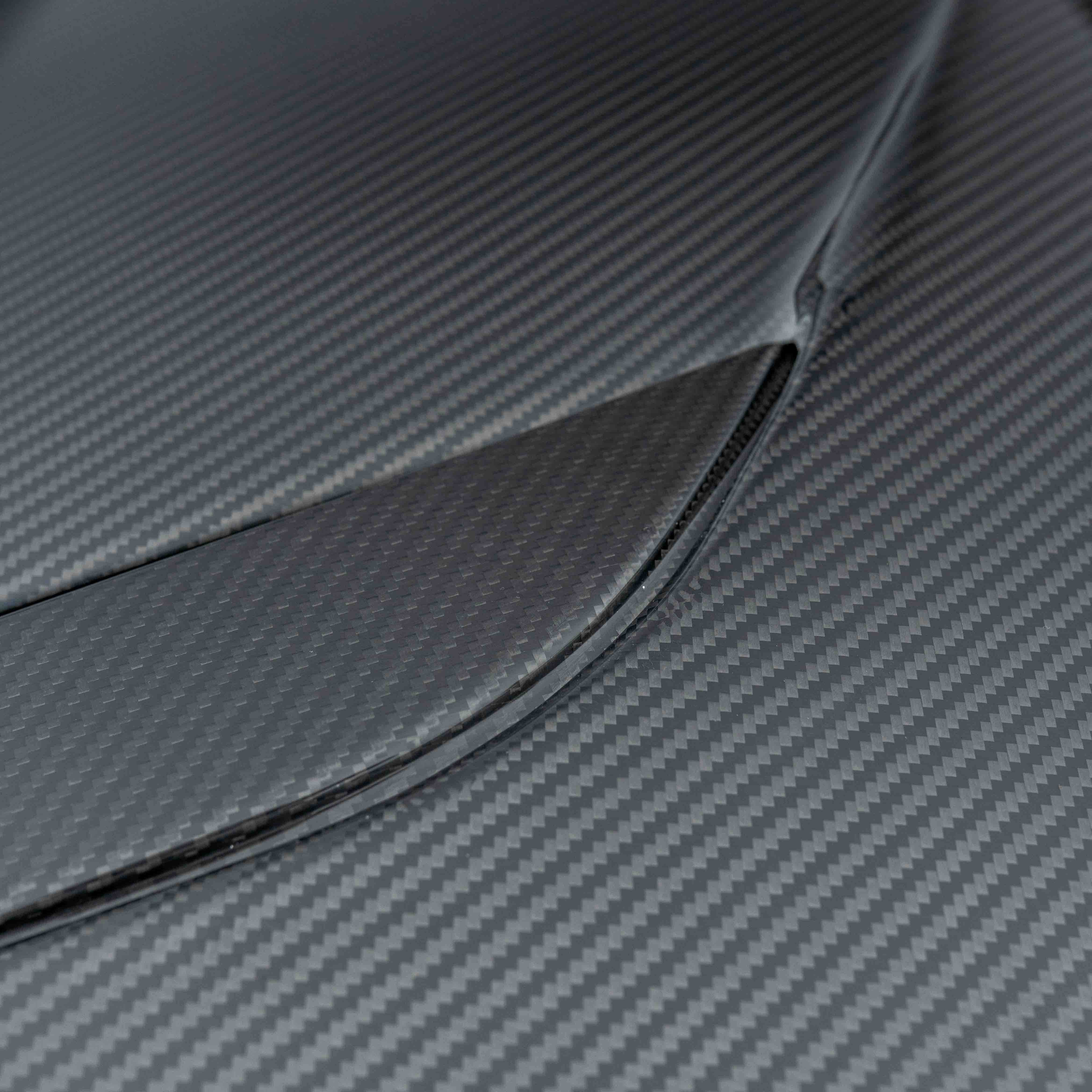 BMW F90 M5 and G30 5 Series carbon fibre bonnet by CT Carbon, showcasing the lightweight, aerodynamic design and glossy finish.