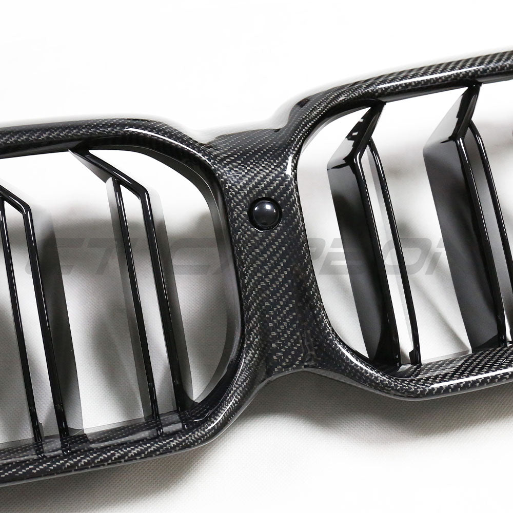 BMW F90 M5 and G30 G31 5 Series LCI carbon fibre grille by CT Carbon, showing close-up of black textured grille with sleek finish.