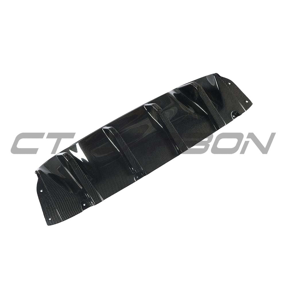 BMW F90 M5 saloon with CT Carbon full carbon fibre kit including front bumper, side skirts, and rear diffuser.