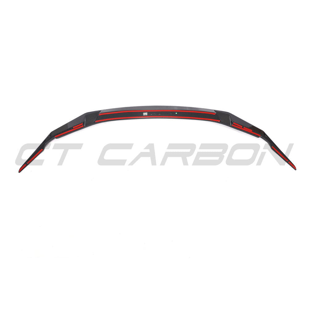 BMW F90 M5 and M5C LCI carbon fiber splitter by CT Carbon, showing sleek, aerodynamic design on a high-performance car.