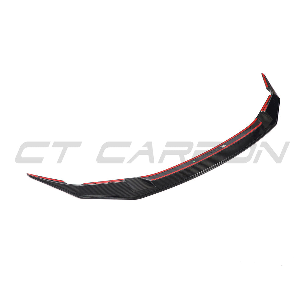 BMW F90 M5 and M5C LCI carbon fiber splitter by CT Carbon, showcasing sleek aerodynamic design and textured carbon finish.