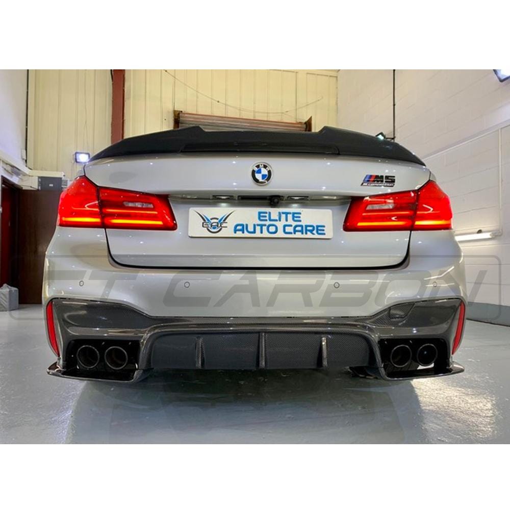 BMW F90 M5 saloon full carbon fibre kit by CT Carbon, including front splitter, side skirts, and rear diffuser, in 3D style.