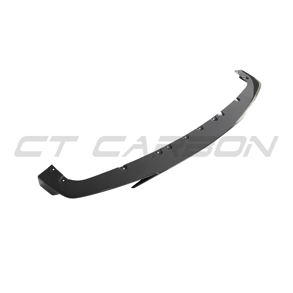 BMW F95 X5M 2019-2022 pre-LCI carbon fiber splitter by CT Design, showing sleek aerodynamic design on the front of the vehicle.