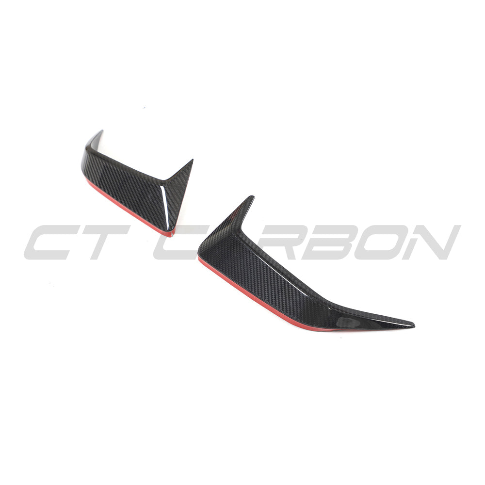 BMW F95 X5M 2023+ LCI carbon fibre rear bumper trim by CT Design, showcasing sleek, textured carbon fibre finish on the bumper.
