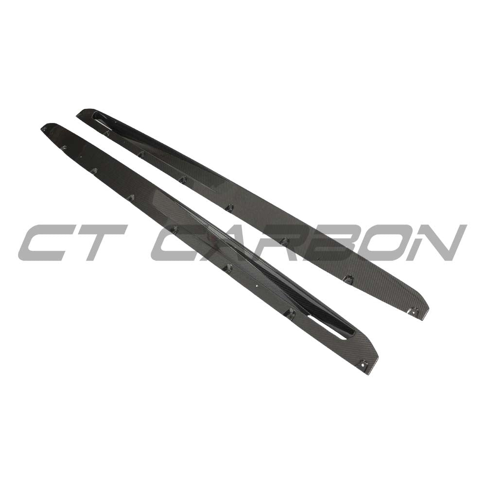 BMW F95 X5M and G05 X5 2018+ carbon fibre side skirts by CT Design, showcasing sleek, lightweight aerodynamic enhancements.