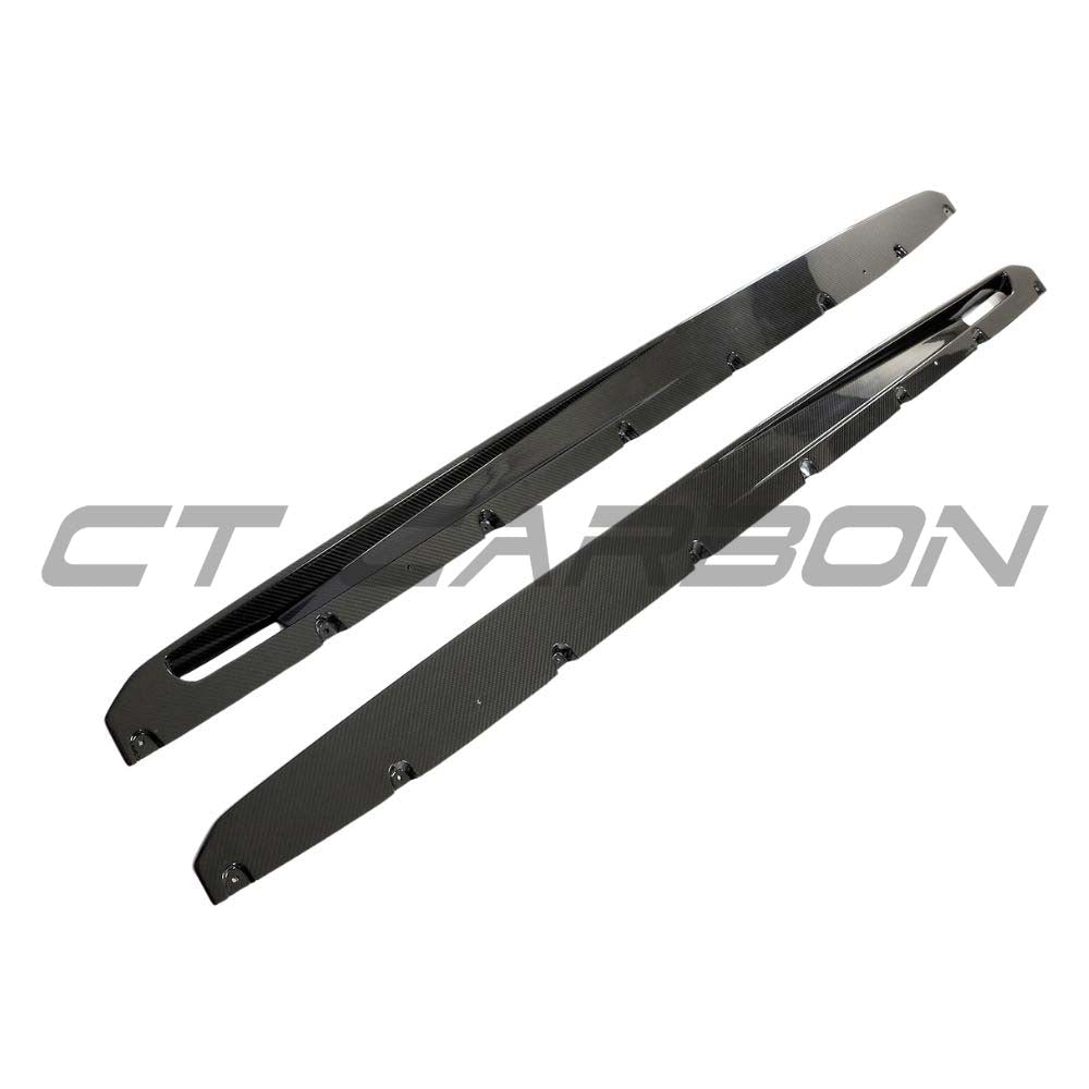 BMW G05 X5/X5M LCI 2023+ carbon fibre side skirts kit by CT Carbon, showcasing sleek, lightweight carbon fibre design on the vehicle.