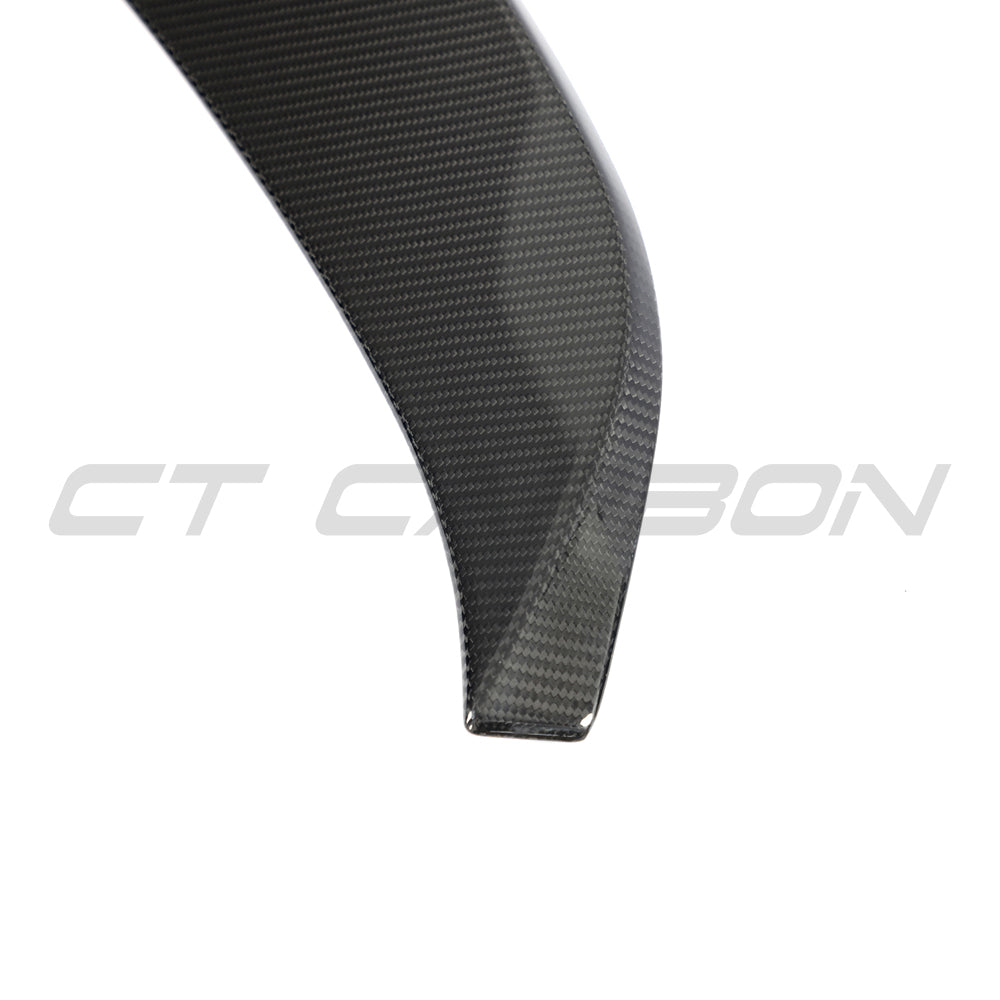BMW F96 X6M and G06 X6 carbon fibre boot spoiler by CT Design, showcasing sleek aerodynamic design on the rear of the vehicle.