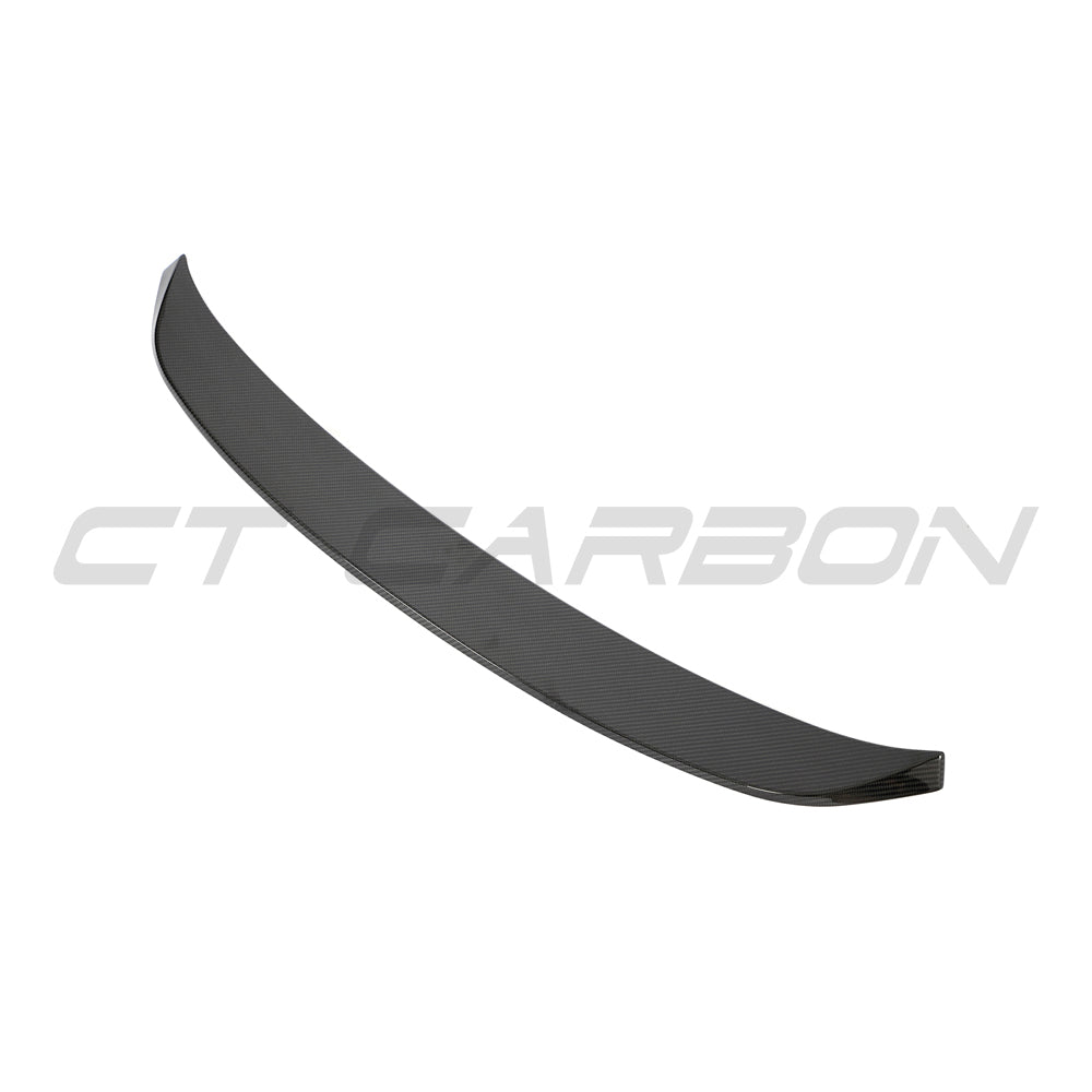 BMW F96 X6M and G06 X6 carbon fibre boot spoiler by CT Design, showcasing sleek, aerodynamic design on the vehicle's rear.