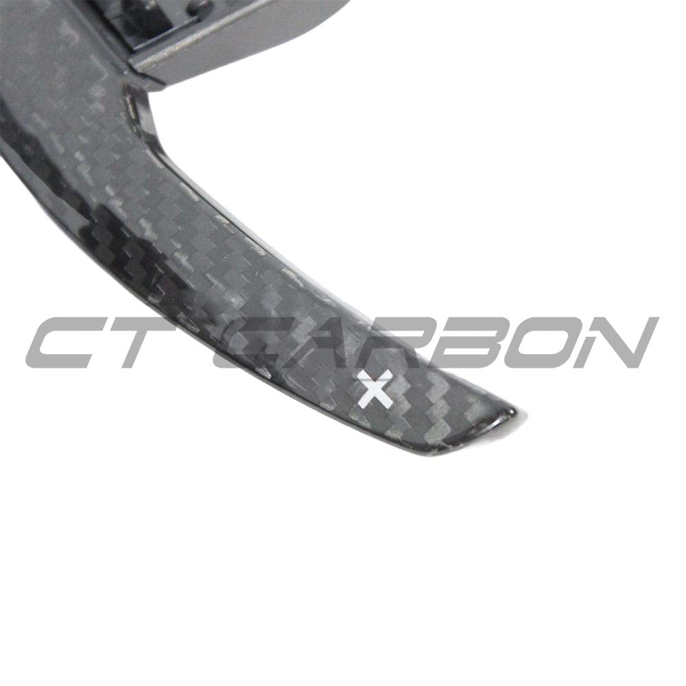 BMW Fxx carbon fiber shifter paddles V2 by CT Carbon, showing sleek black carbon fiber design for sporty interior upgrade.