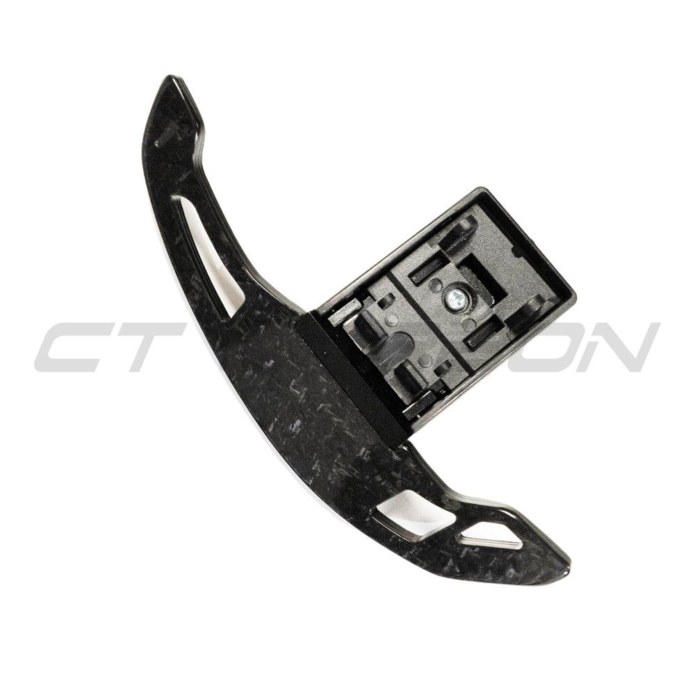 BMW Fxx forged carbon fiber shifter paddles V3 by CT Carbon, showcasing sleek, lightweight carbon fiber design for enhanced driving control.