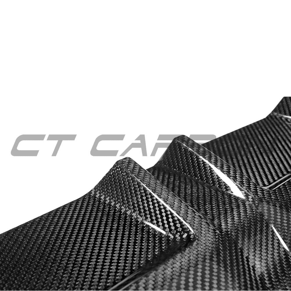 BMW G42 2 Series 2022+ carbon fibre diffuser by CT Carbon, V1, showcasing sleek aerodynamic design and premium carbon fiber finish.