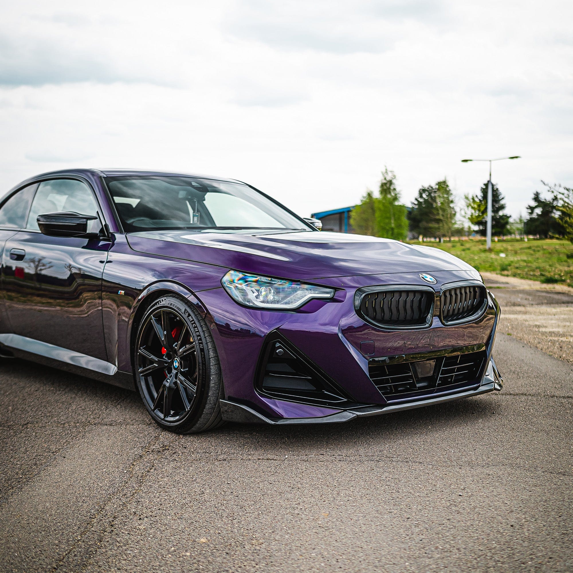 BMW G42 2 Series full carbon fiber kit by CT Carbon, showcasing carbon fiber panels and aerodynamic styling for the vehicle.