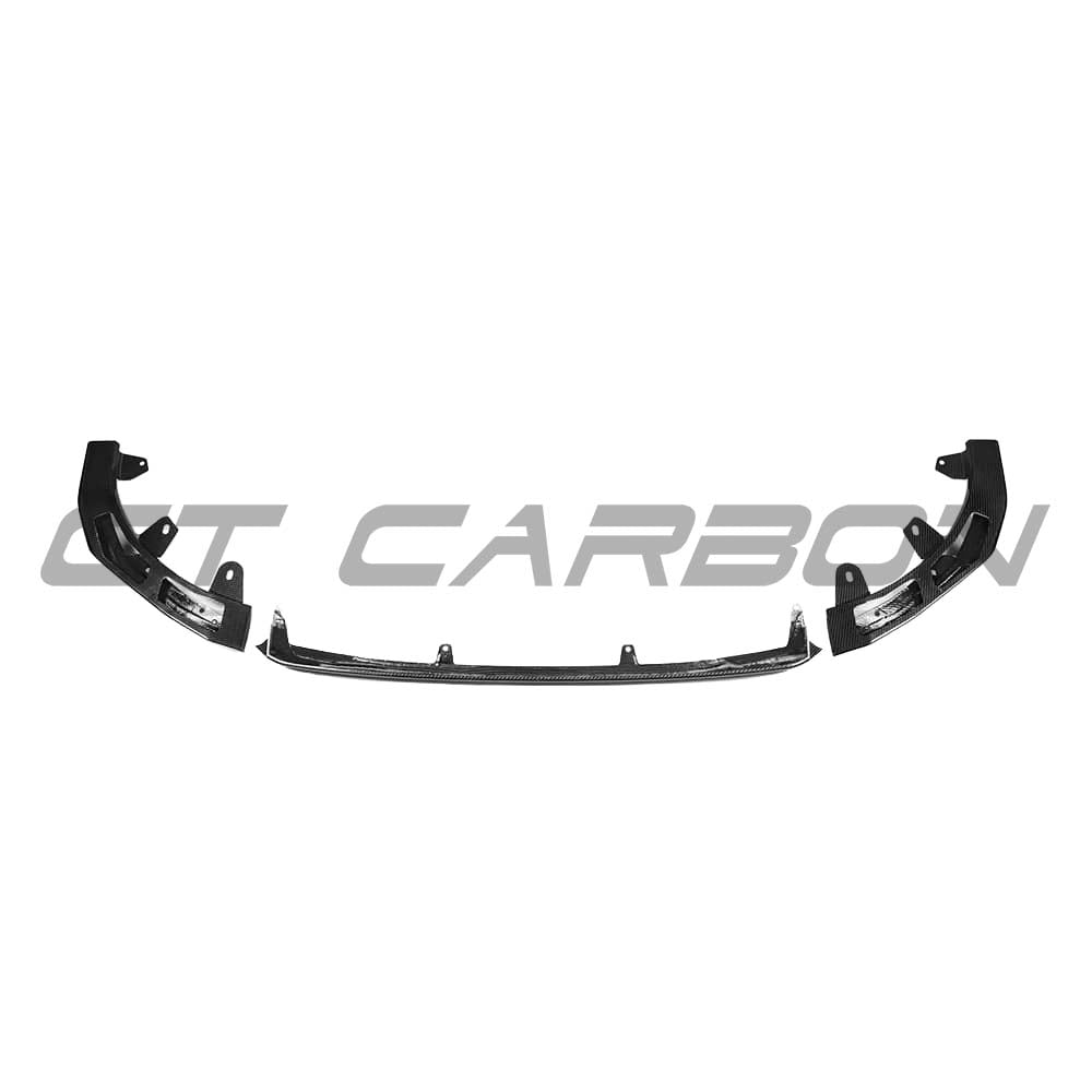 BMW G42 2 Series full carbon fibre kit by CT Carbon, featuring splitter and aerodynamic enhancements on a sleek car.