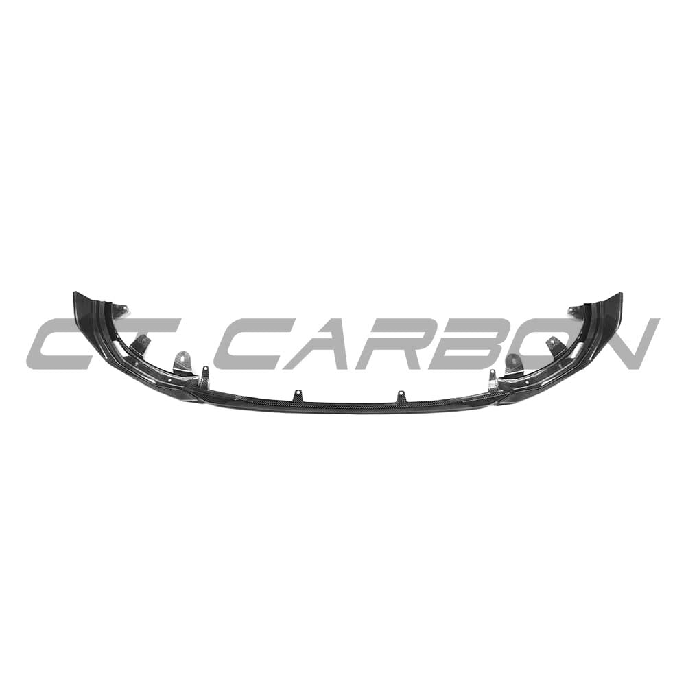 BMW G42 2 Series full carbon fibre kit by CT Carbon, featuring splitter and MP style enhancements on a sleek car.