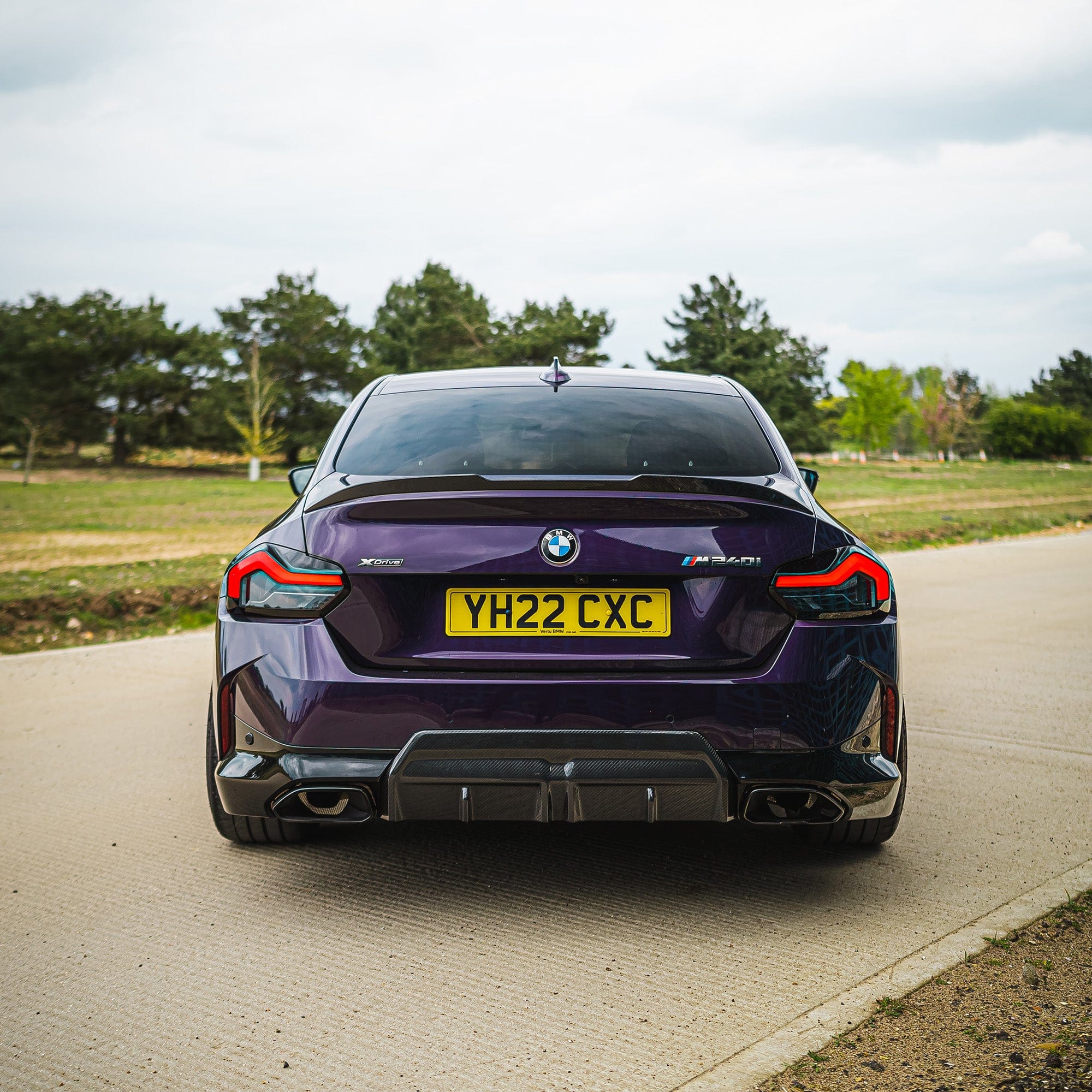 BMW G42 2 Series carbon fibre spoiler by CT Carbon, V2 style, sleek aerodynamic design for G87 M2 and G42 models.