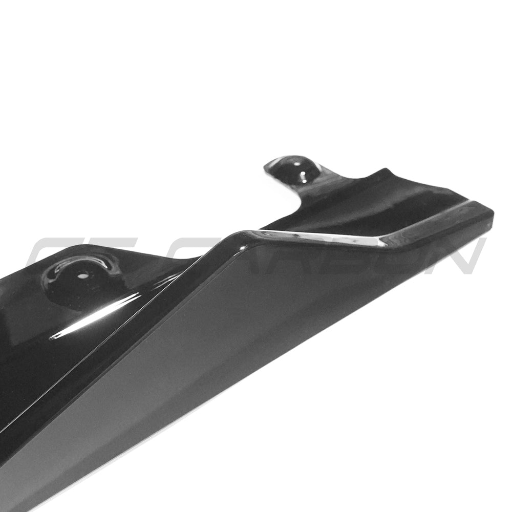 BMW G42 2 Series side skirts by CT Carbon in gloss black, designed for a sleek, sporty look on the vehicle.