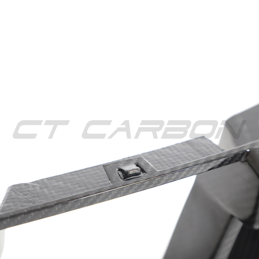 BMW G87 M2 carbon fibre lower grille by CT Design, showcasing sleek black carbon fiber with detailed grille openings.