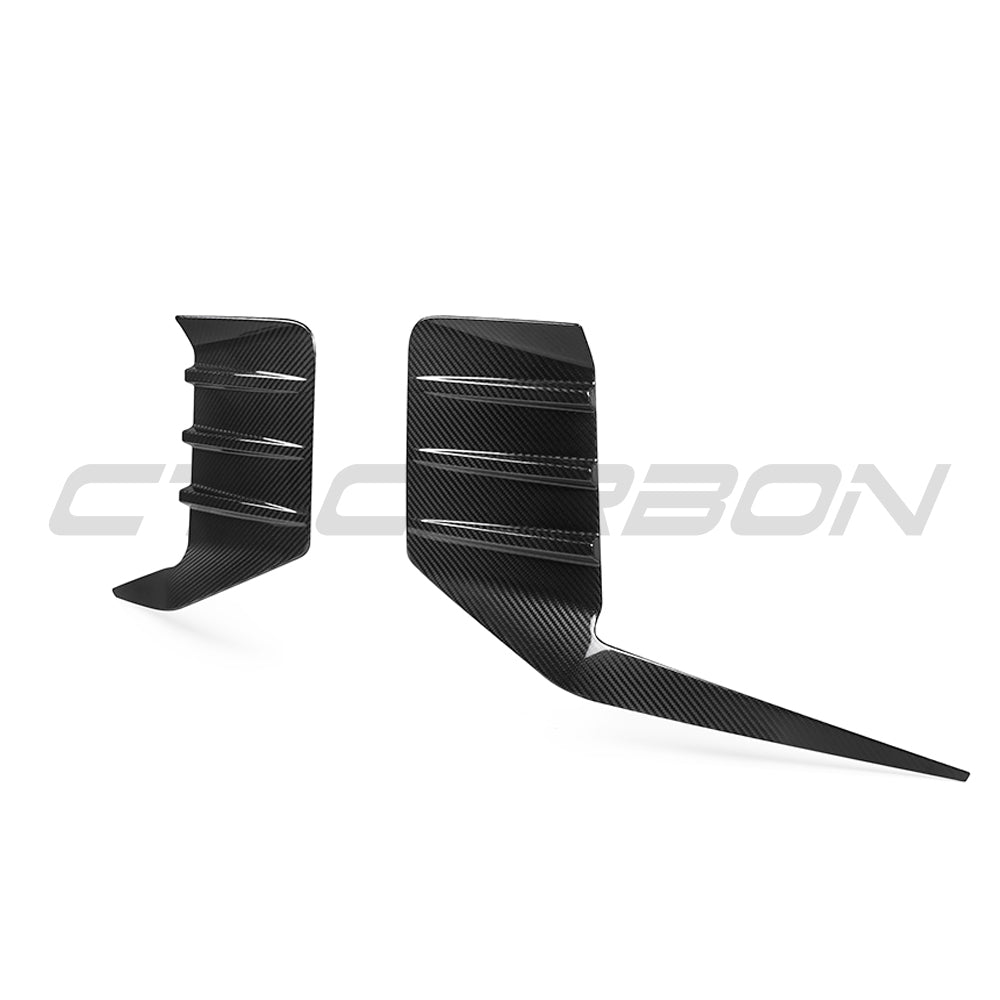 BMW G87 M2 carbon fiber rear bumper trim accessory by CT Carbon, showcasing sleek, lightweight carbon fiber finish on the bumper.